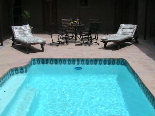 Heated salt water pool in enclosed courtyard